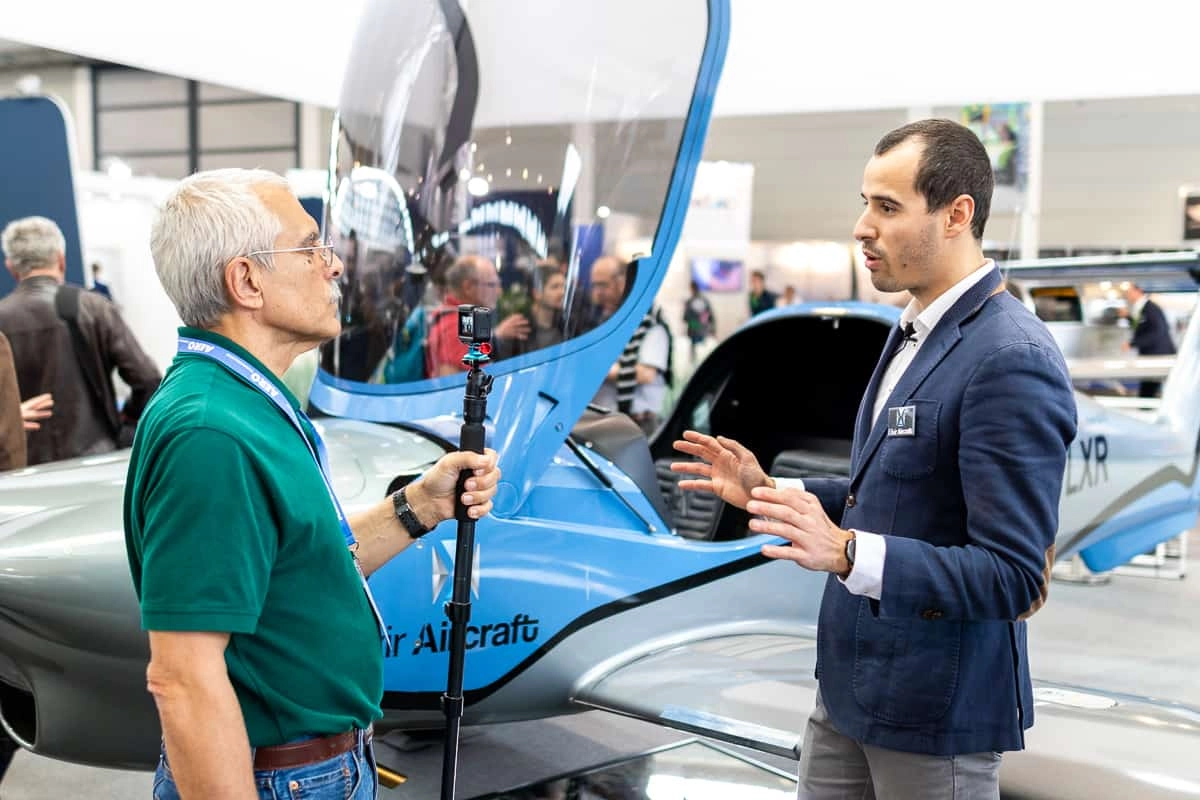 AvWeb's Paul Bertorelli discussing with Elixir Aircraft co-founder Cyril Champenois